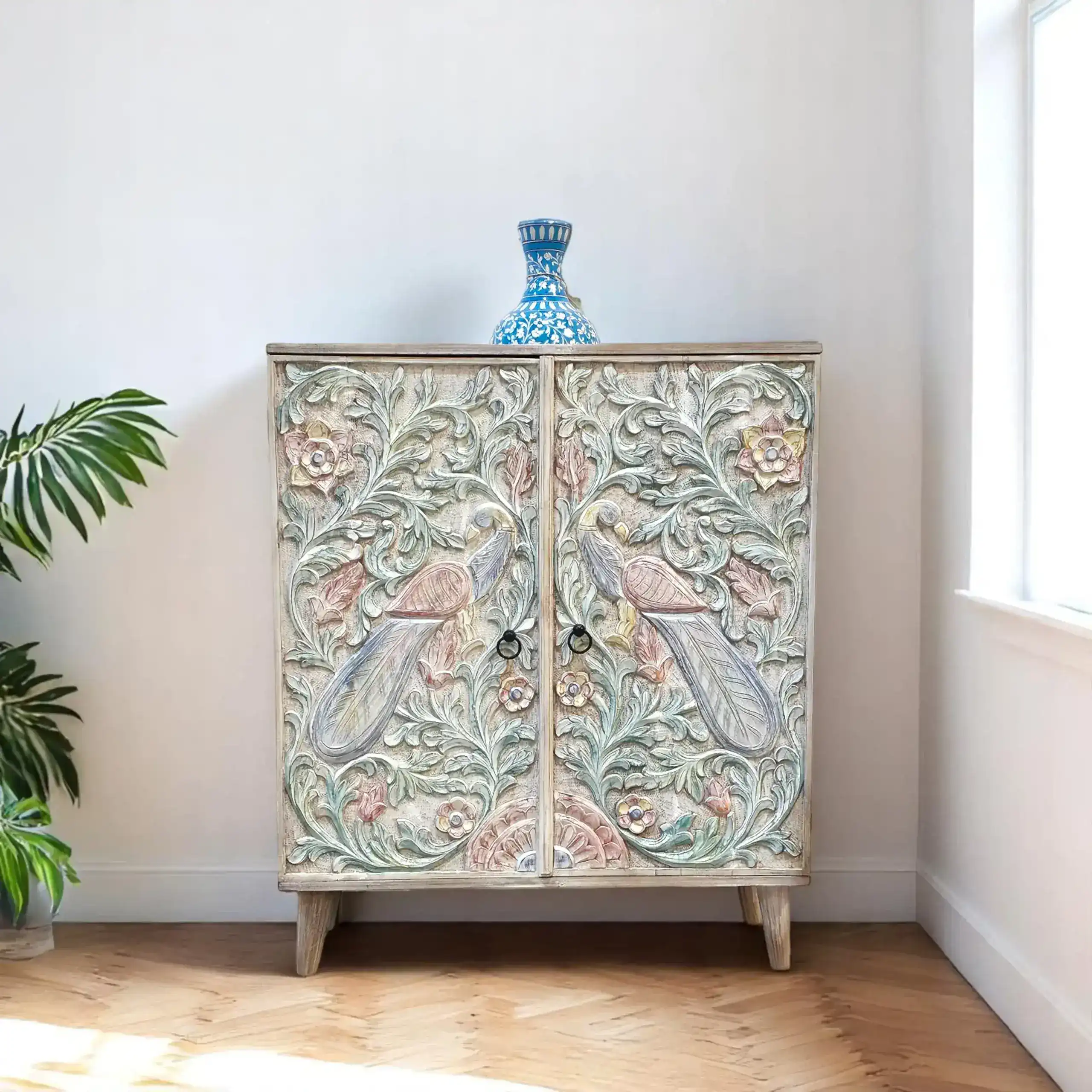 The Peacock Carved Cabinet